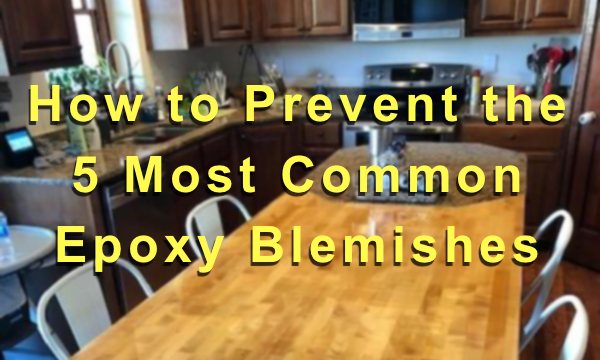 A blurred photo of an epoxy kitchen island counterrtop with a text overlay that says "How to Prevent the 5 Most Common Epoxy Blemishes"