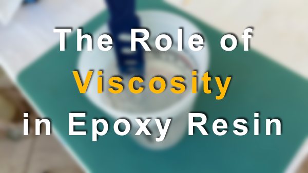 A blurred photo of an epoxy batch being prepared, with a text overlay that says "The Role of Viscosity in Epoxy Resin"